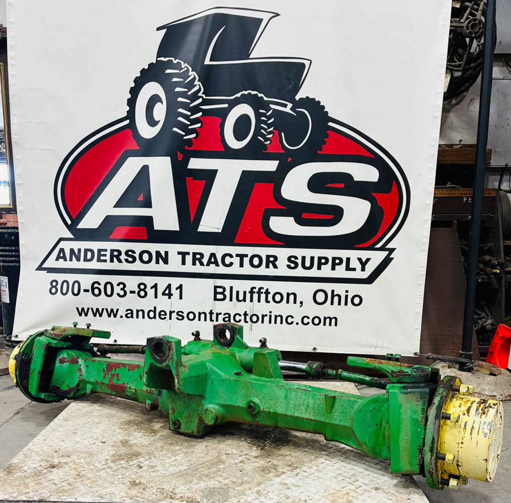 GOOD USED FRONT AXLE ASSY - RE216203