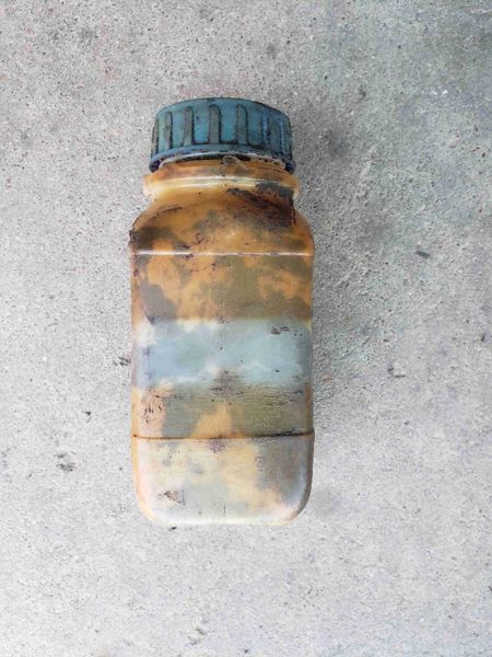 Case/case I.H. CX100 Container And Cap, Remote Spillage