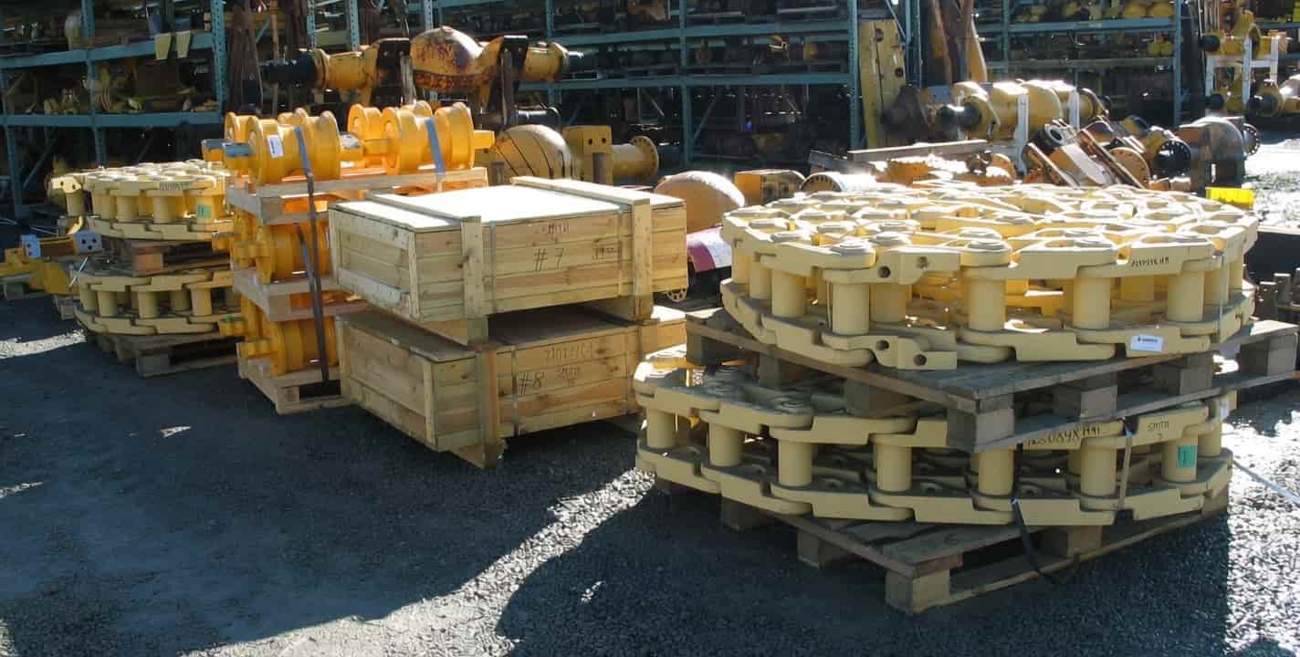 FP Smith Parts stocks quality undercarriage components including track chains, rollers, idlers, and sprockets