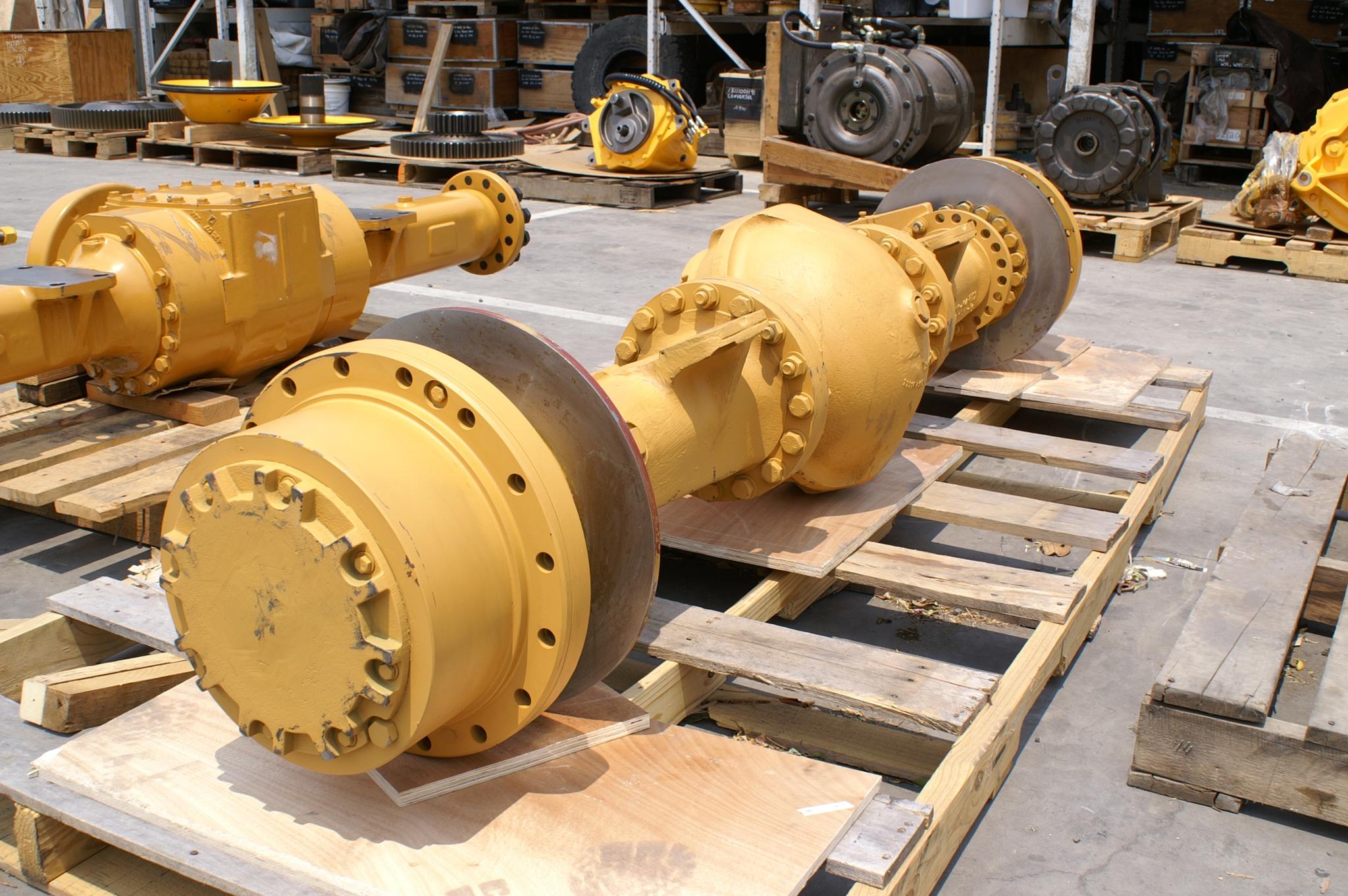 Axles, Steering Drives, Differentials, Transmissions, Torque Converters, Gears, Sprocket Carriers